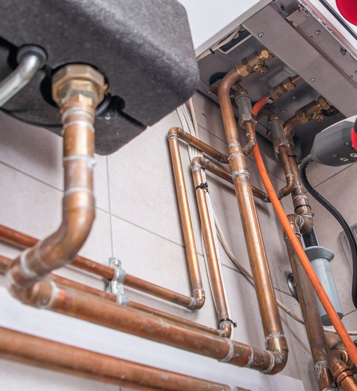 An image of an individual testing for gas leaks.