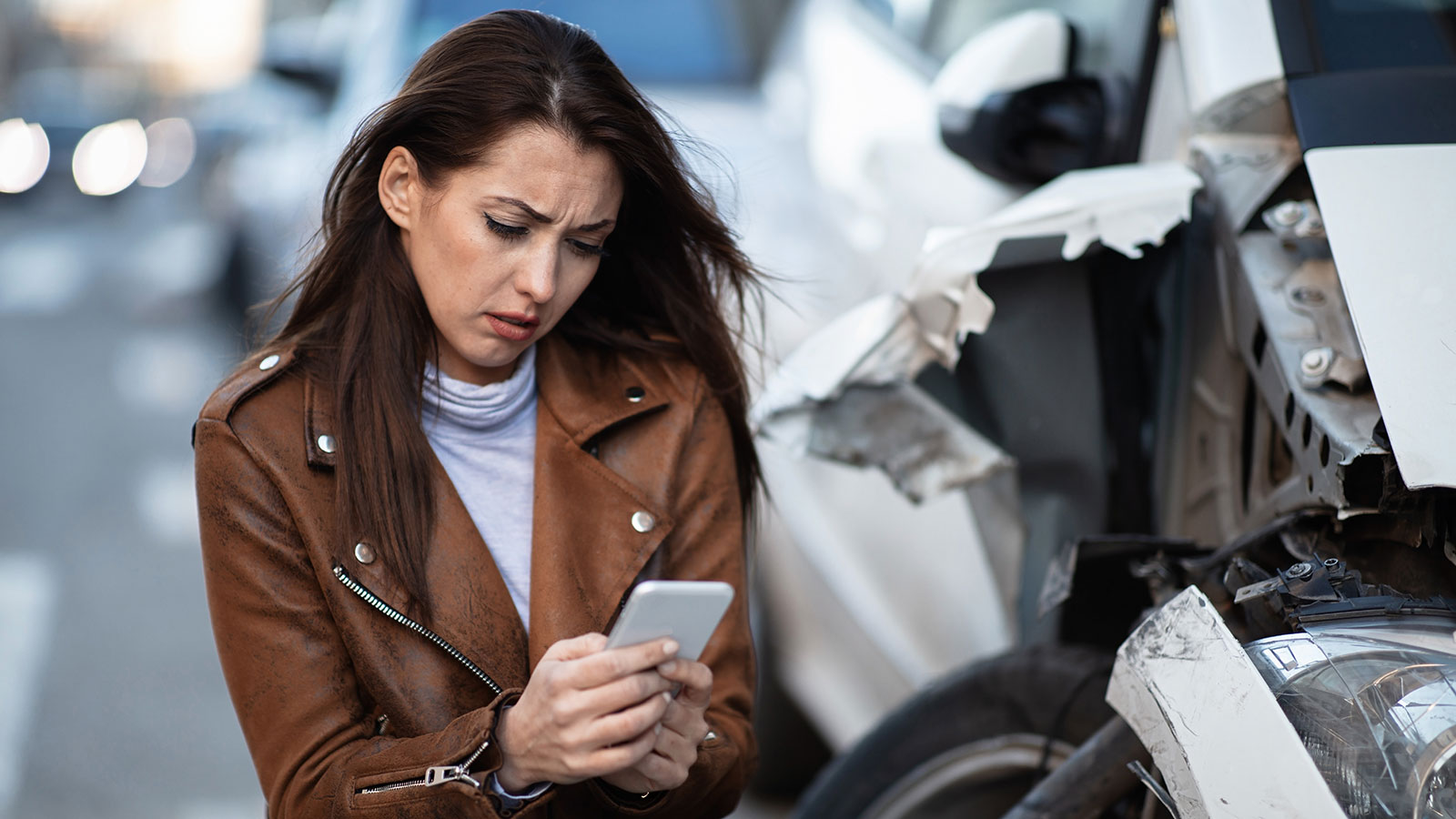 A woman who is calling for help after a major accident.
