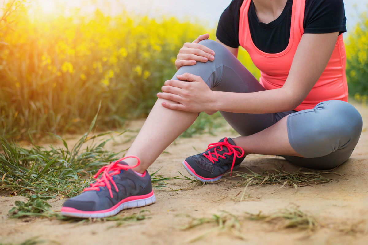 A woman who has injured her leg.